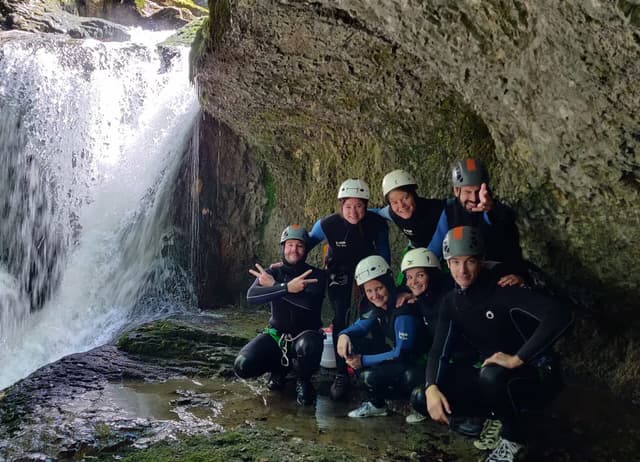 Canyoning in Jura with a group in Malvaux